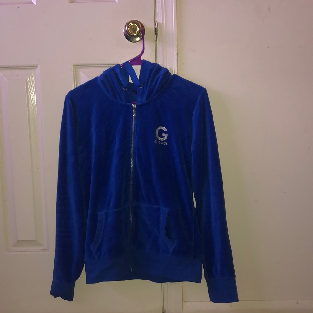 A blue guess jacket with a symbol sequin!